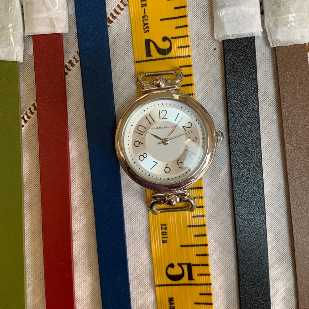 NWOT Stainless steel wristwatch with 5 colors of interchangeable bands